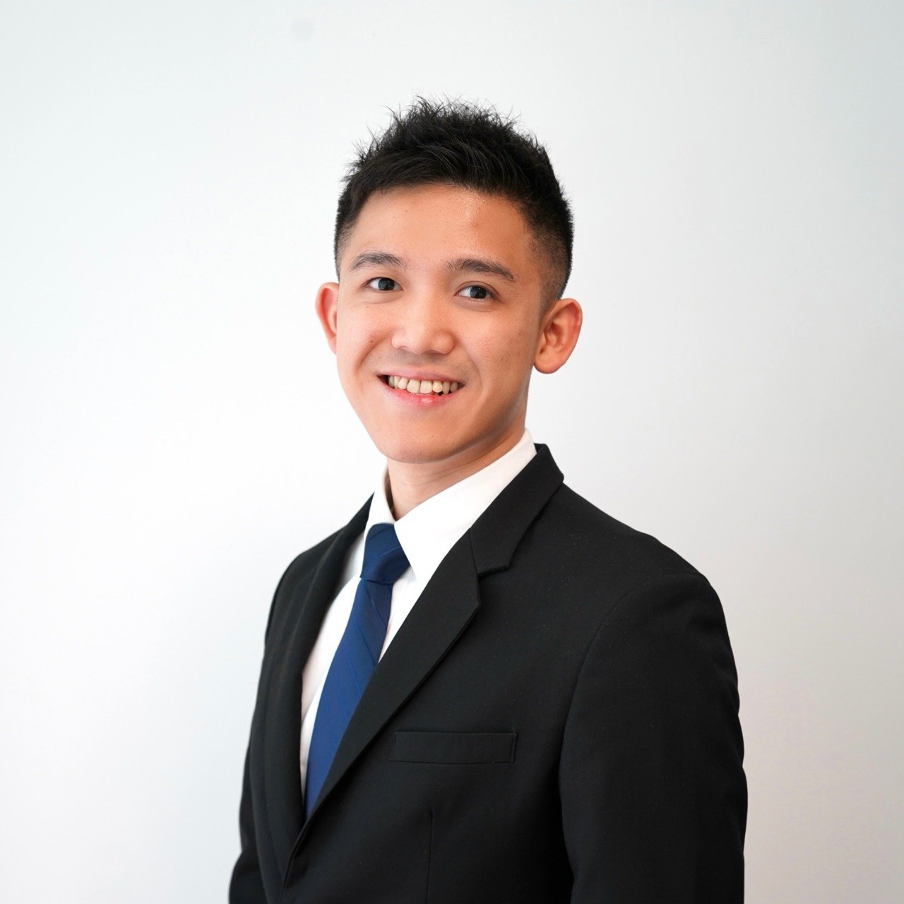 Jordan Lee in professional attire